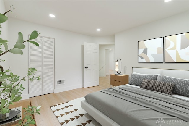 bedroom featuring light hardwood / wood-style floors