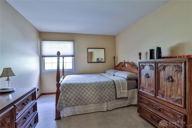 bedroom with light carpet