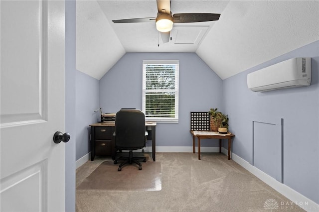 home office with a wall mounted air conditioner, carpet, a textured ceiling, vaulted ceiling, and ceiling fan