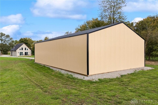 view of outdoor structure with a yard