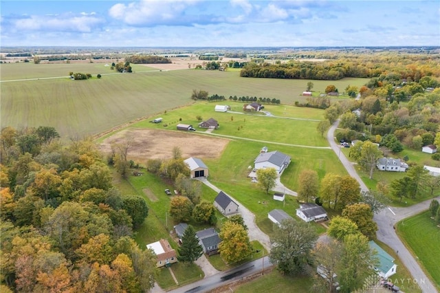 birds eye view of property with a rural view