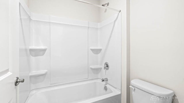 bathroom with toilet and shower / bathtub combination