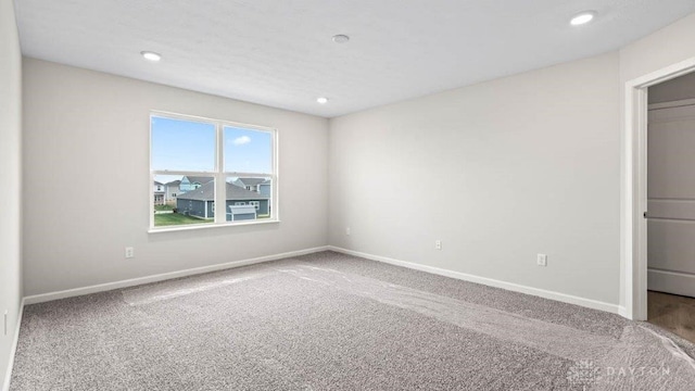 view of carpeted spare room