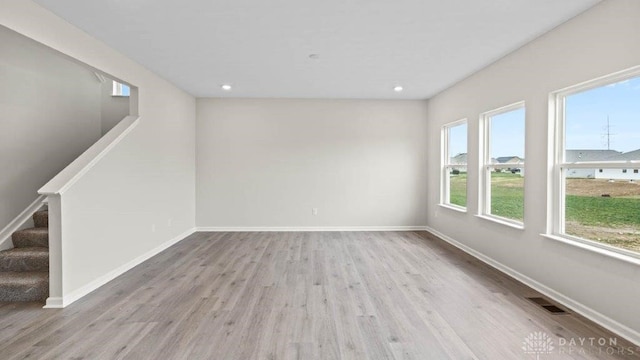 empty room featuring light hardwood / wood-style floors