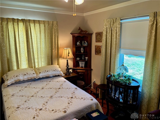 bedroom with crown molding