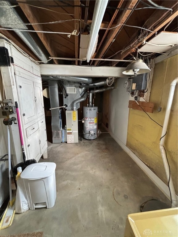 basement with heating unit and water heater