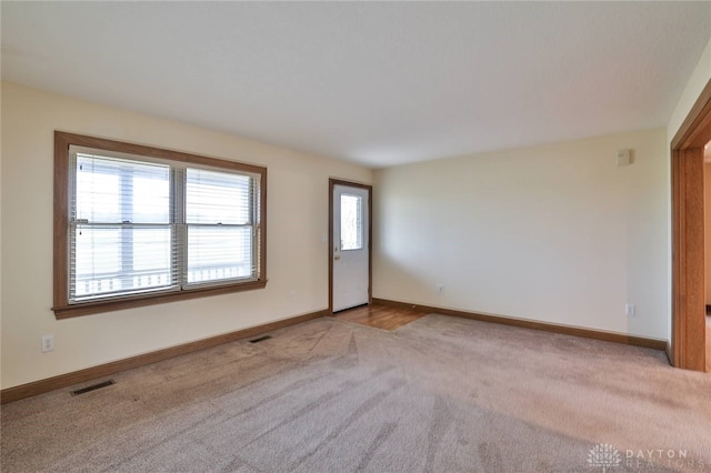 view of carpeted spare room