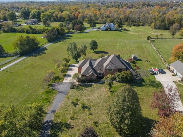 birds eye view of property with a rural view