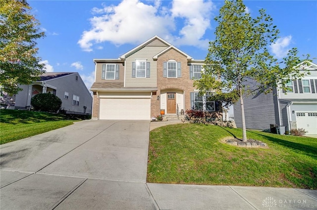 view of front of house featuring brick siding, an attached garage, concrete driveway, and a front yard