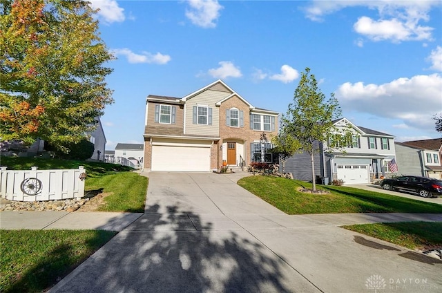 traditional-style home with concrete driveway, an attached garage, brick siding, and a front yard