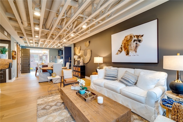 living room with light hardwood / wood-style flooring