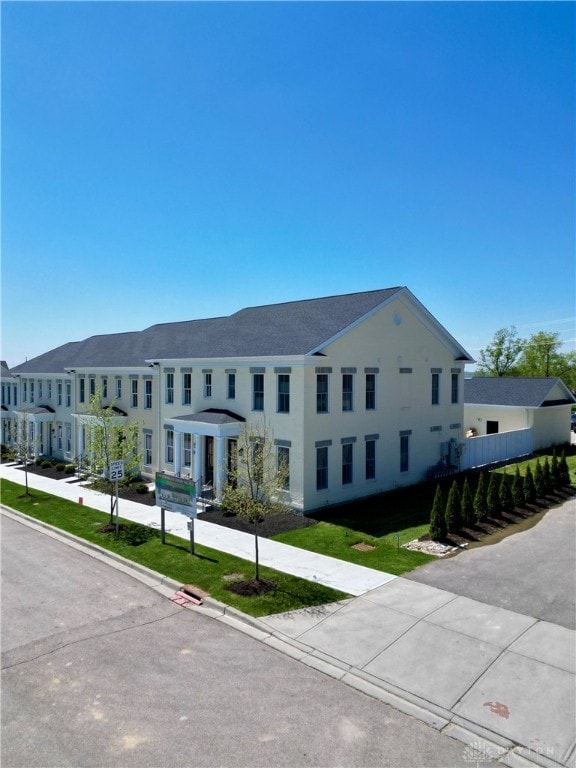 exterior space featuring a front yard