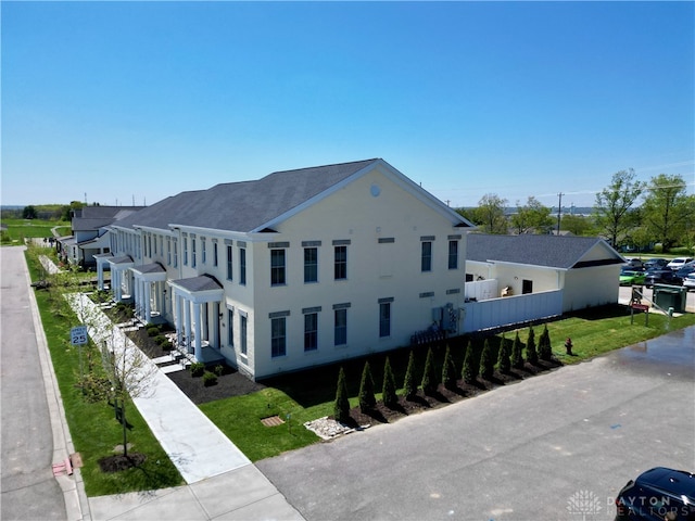 exterior space with a front yard