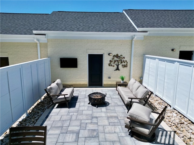 view of patio featuring a fire pit