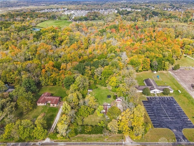 drone / aerial view with a view of trees