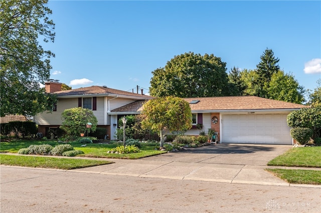 split level home with a garage