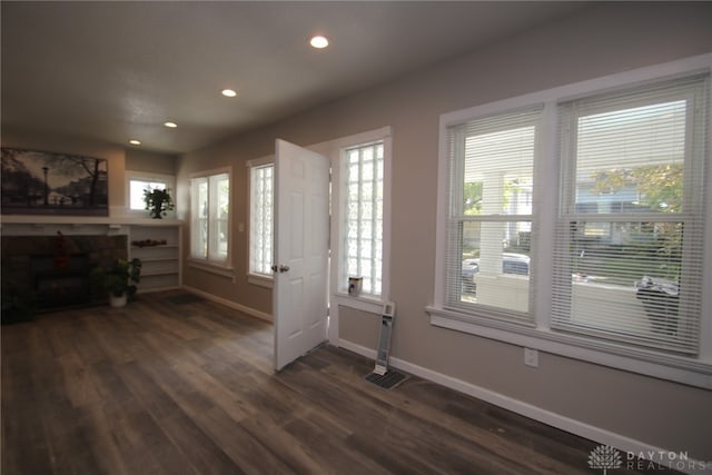 entrance foyer with dark hardwood / wood-style floors