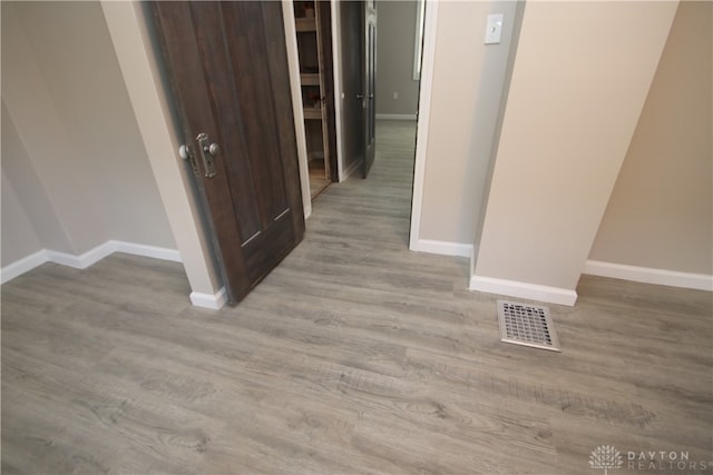 hall featuring light hardwood / wood-style flooring