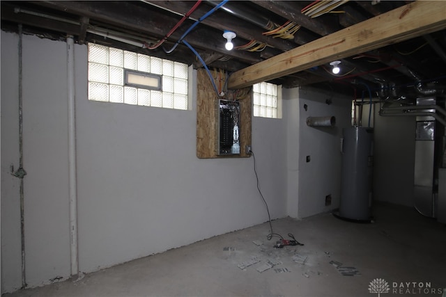 basement featuring gas water heater and heating unit