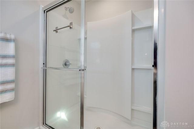 full bathroom with a shower stall