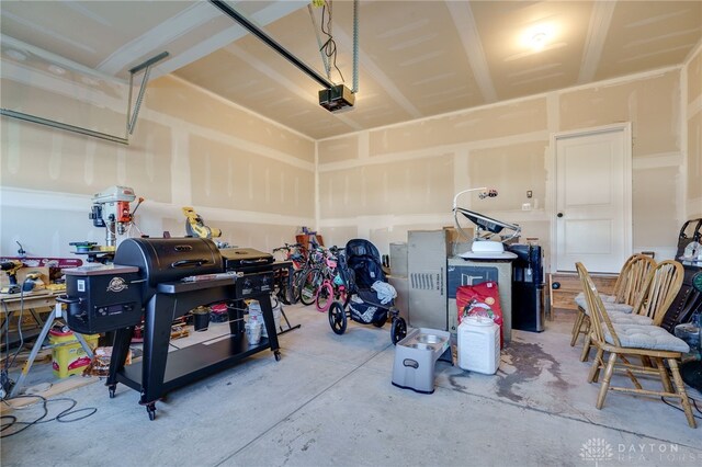 garage featuring a garage door opener