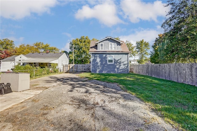 exterior space with a yard