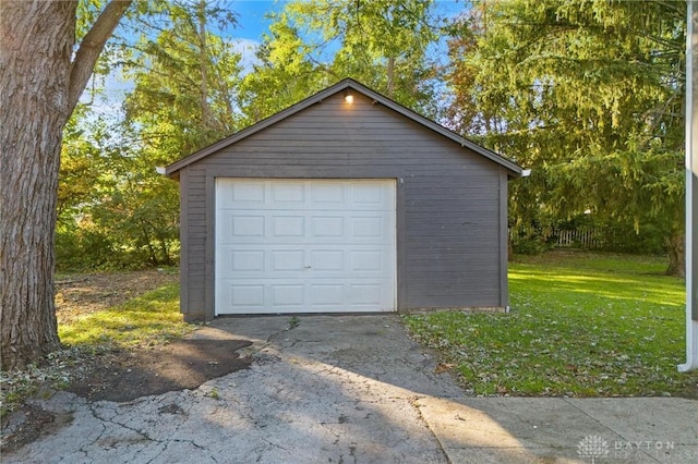 garage featuring a yard