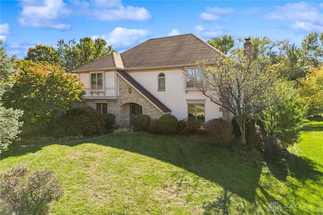 view of front of house with a front yard