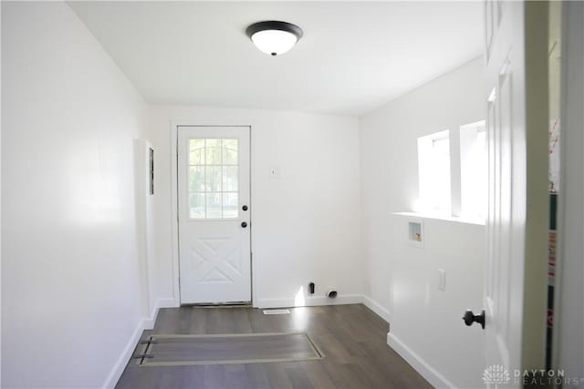 laundry area featuring dark hardwood / wood-style flooring and washer hookup