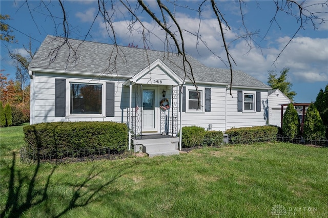 view of front of home with a front lawn