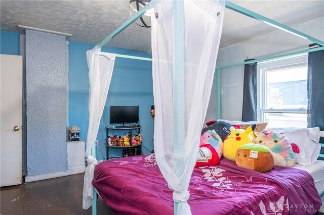 bedroom with a textured ceiling