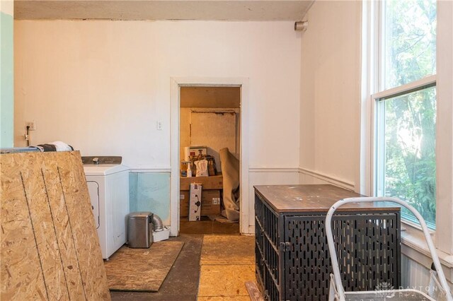 clothes washing area featuring washer / clothes dryer