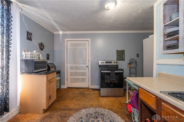 kitchen with stainless steel appliances and a textured ceiling