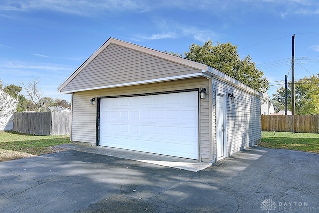 garage with a lawn