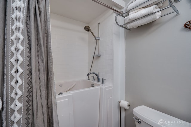 bathroom featuring toilet and shower / bathtub combination with curtain