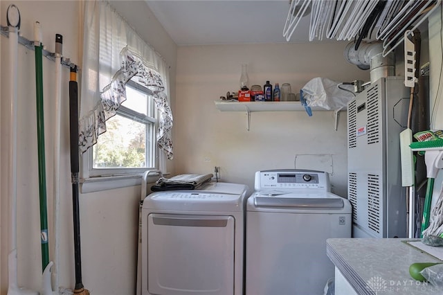 laundry room featuring washer and clothes dryer