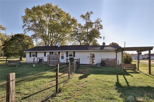 single story home with a front lawn