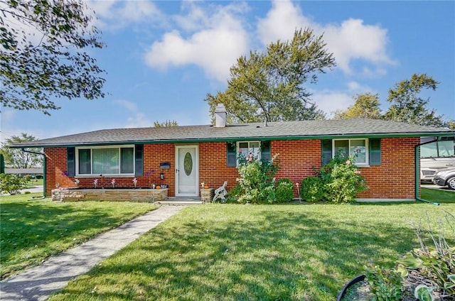 single story home with a front lawn