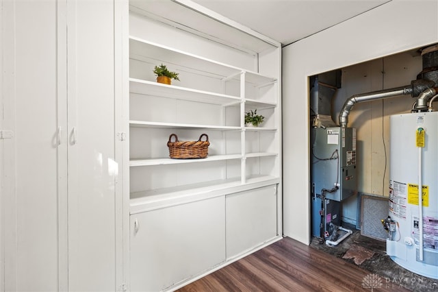 utility room with gas water heater