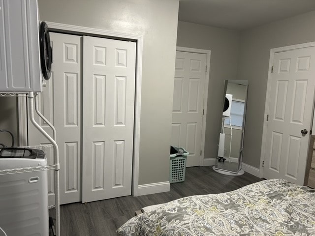 bedroom featuring a closet and dark hardwood / wood-style floors