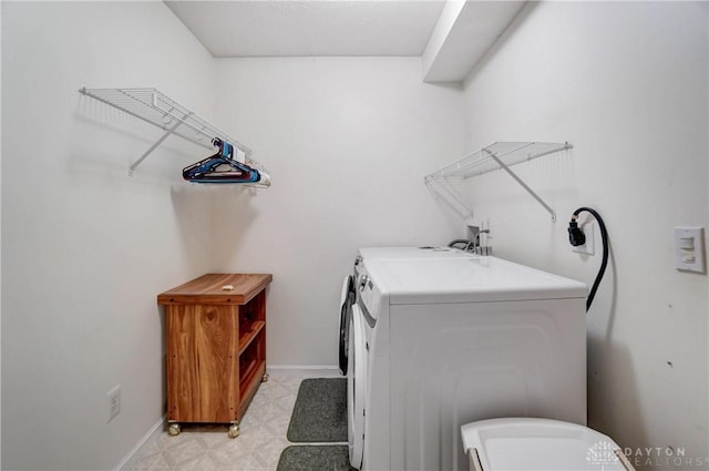 laundry area featuring separate washer and dryer