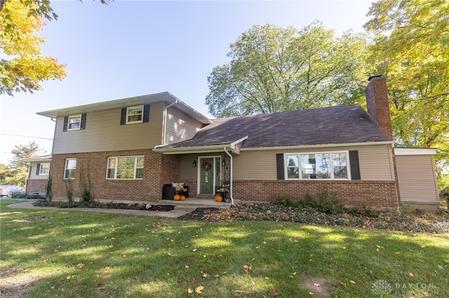 view of front of house featuring a front lawn