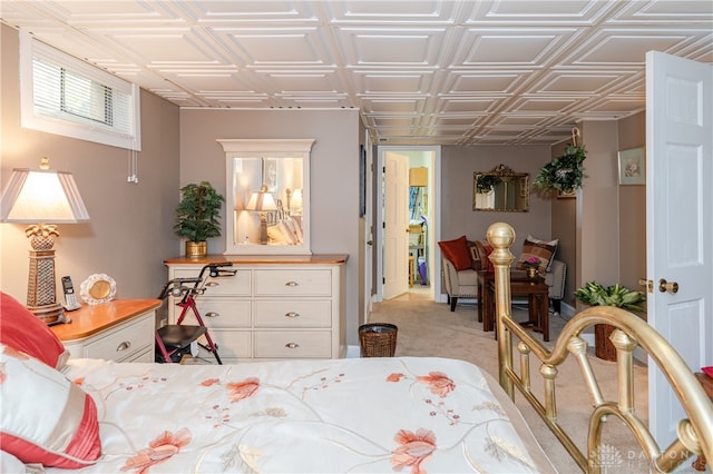 bedroom featuring light colored carpet