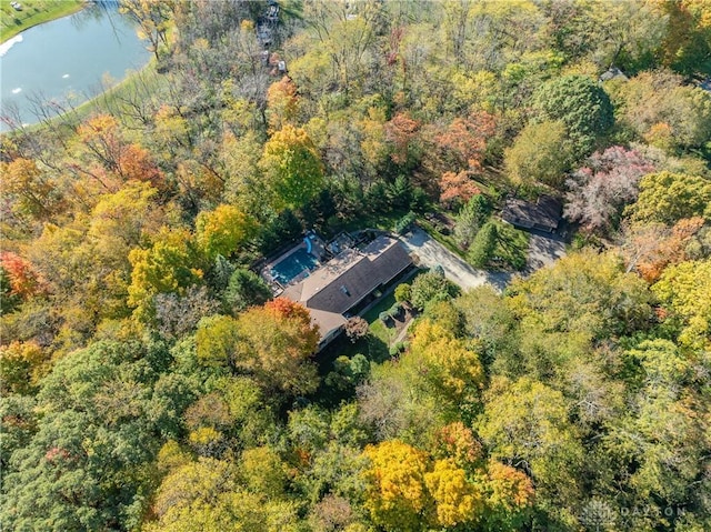 aerial view featuring a water view and a view of trees