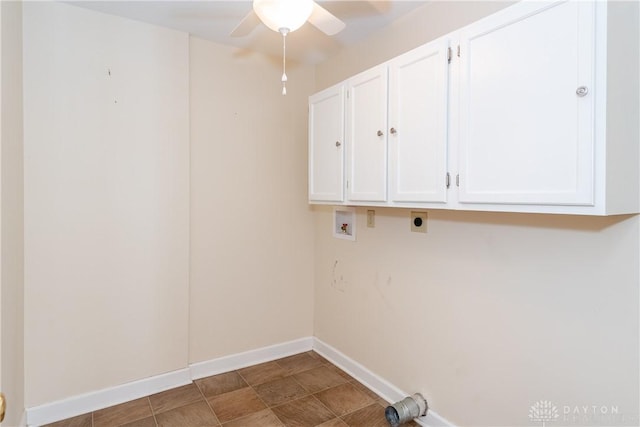 washroom with hookup for an electric dryer, washer hookup, a ceiling fan, baseboards, and cabinet space