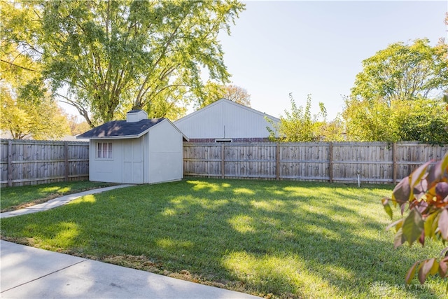 view of yard with a storage unit