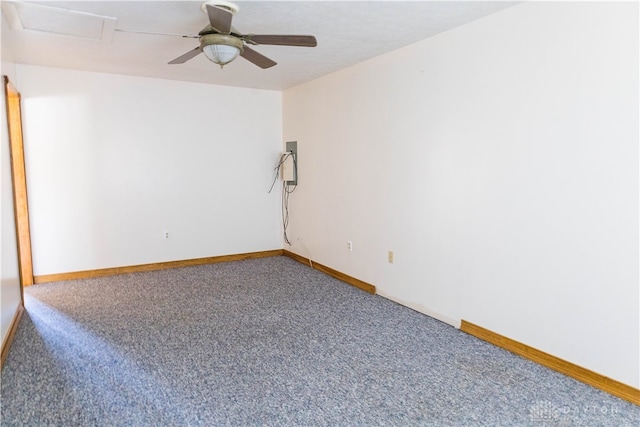 carpeted spare room with ceiling fan