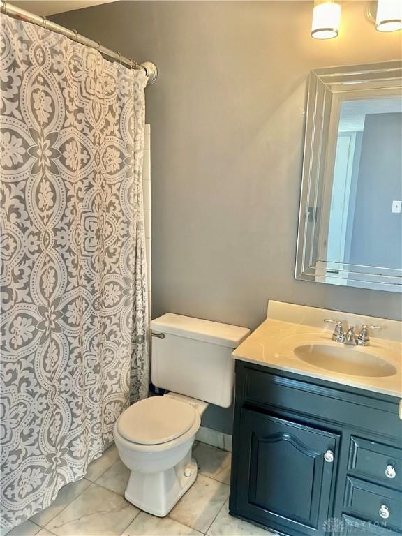 5 Devon Ct, Fairfield, OH 45014 - bathroom featuring vanity, toilet, tile patterned floors, and a shower with curtain