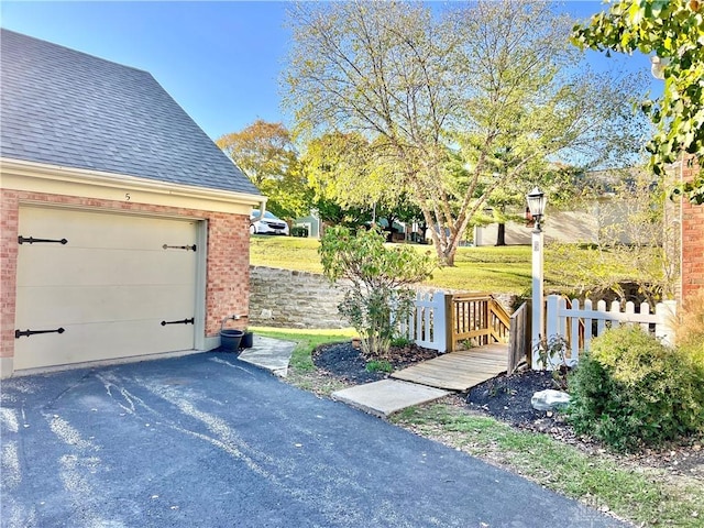 5 Devon Ct, Fairfield, OH 45014 - garage with asphalt driveway