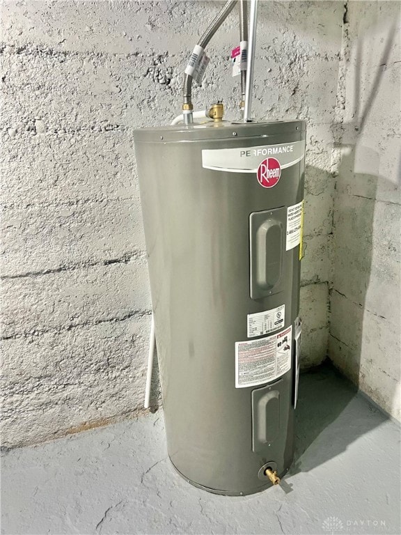 utility room with electric water heater